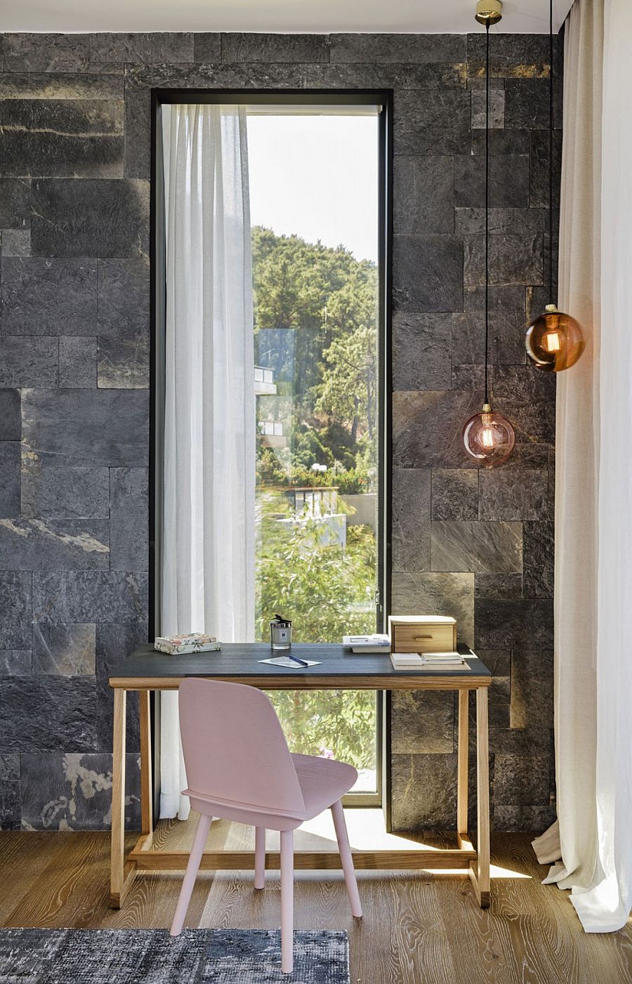 Small bedroom workspace with lovely pendant lighting