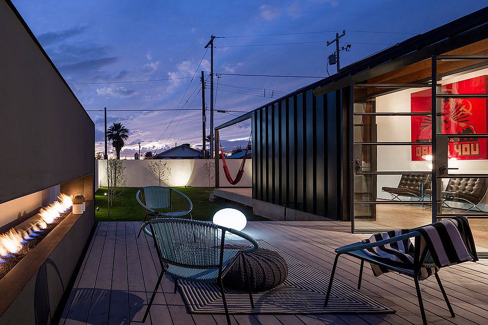 Small outdoor courtyard with a gorgeous fireplace