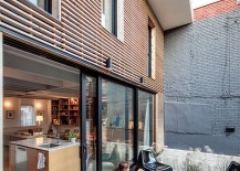 Small-rear-deck-connected-with-the-modern-kitchen-and-living-area-of-the-Montreal-home-217x155
