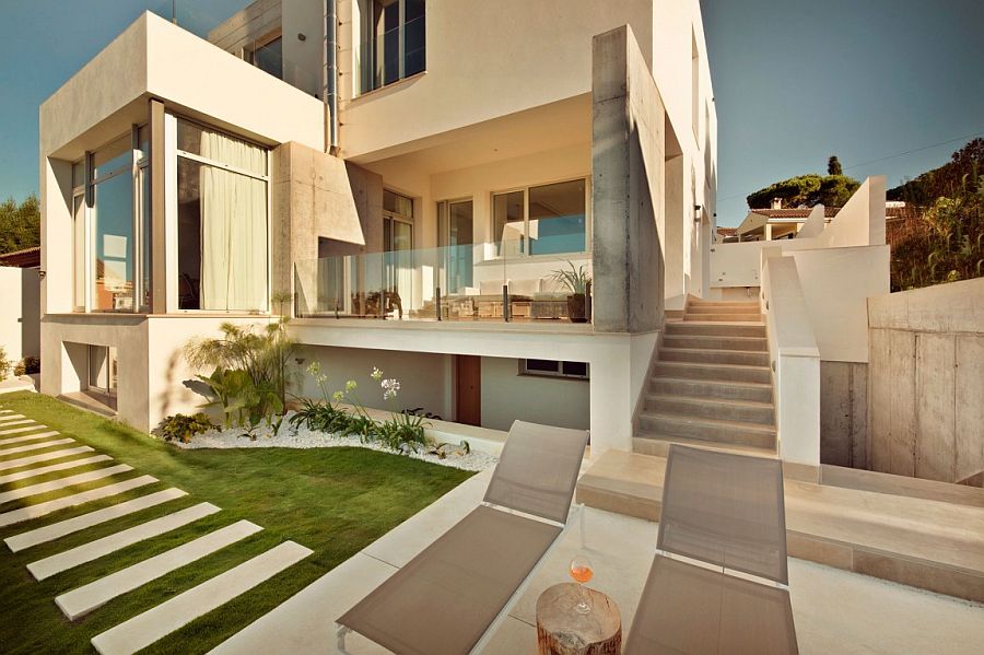 Spacious deck, backyard and pool area of the Spanish home