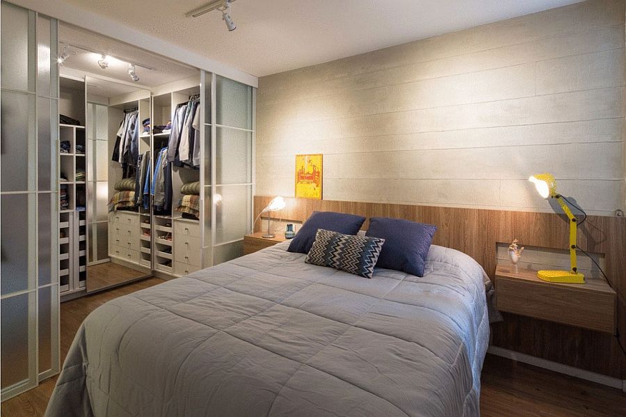 Spacious walk-in closet with translucent glass doors