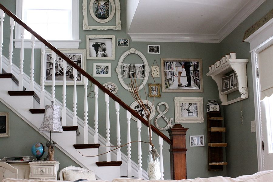 Staircase wall filled with family photos [Design: Kasey Buick]