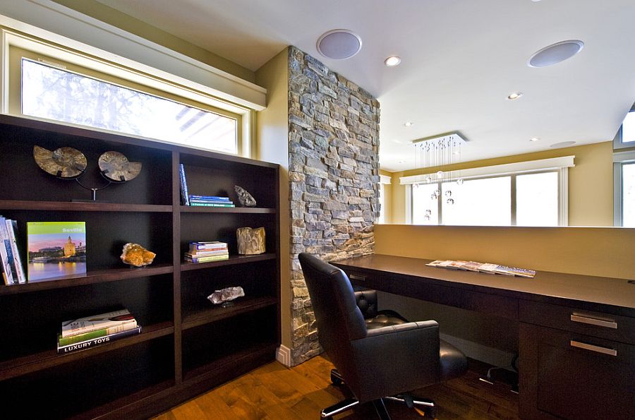 Stone wall architectural feature for the mezzanine level home office [Design: Begrand Fast Design]