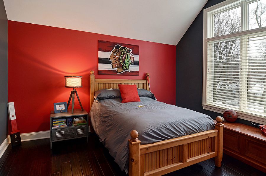 Striking red accent wall is perfect for contemporary spaces