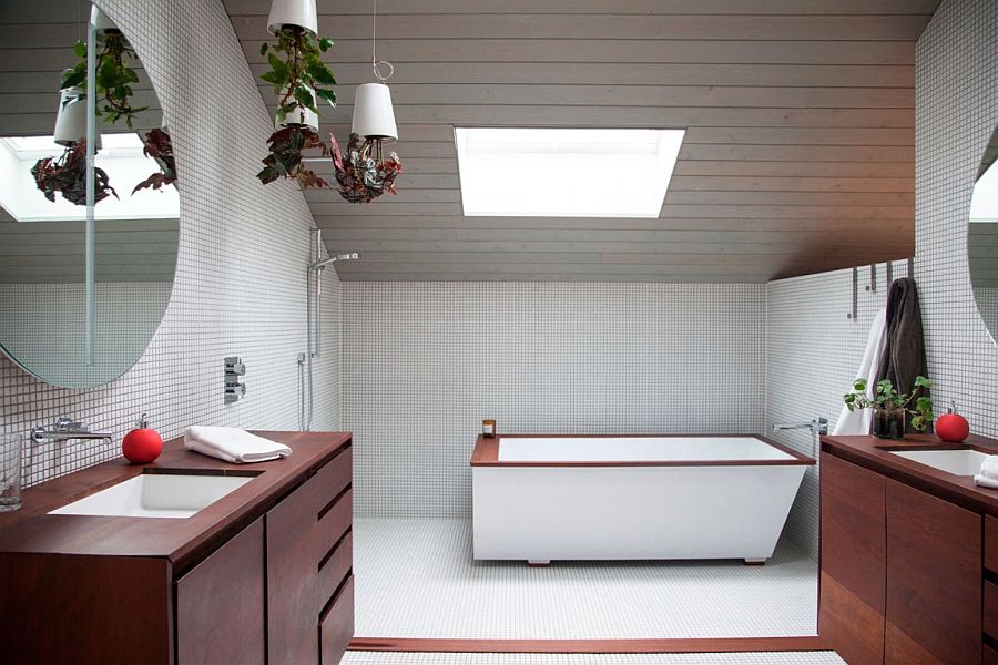 Stunning attic level bathroom with a skylight