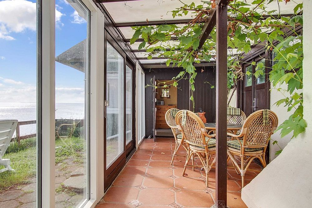 Stunning sunroom offers unabated views of the surrounding landscape [Design: lilienhoff]