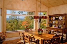 Textured walls for spacious dining room with warm hues
