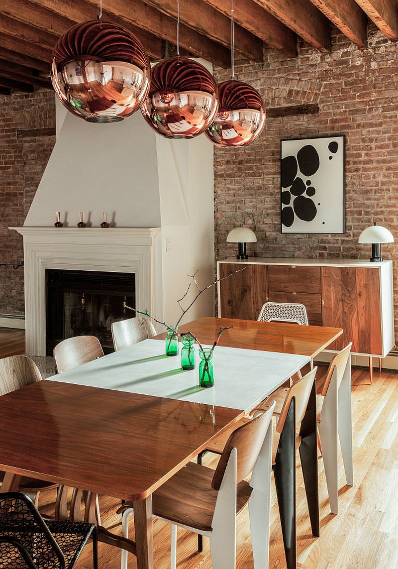 Tom Dixon pendant lights steal the show in the modern industrial dining room