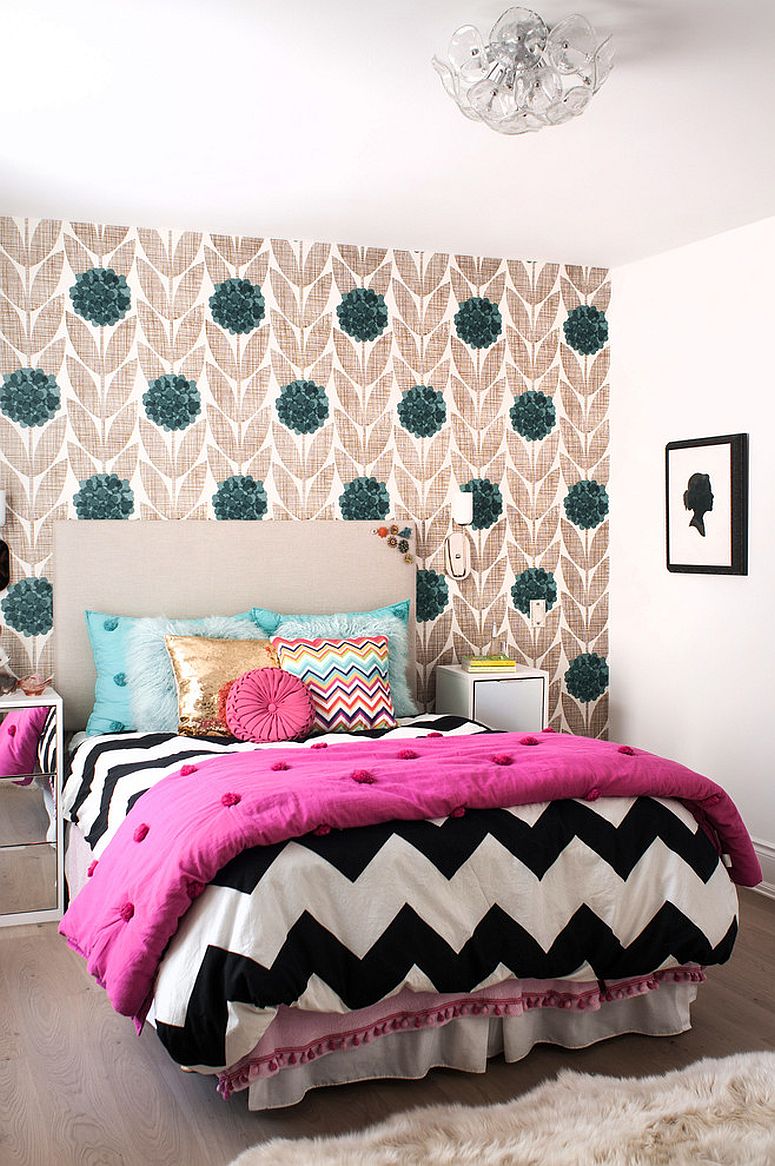 Transitional kids bedroom with wallpapered accent wall and quilt with chevron pattern