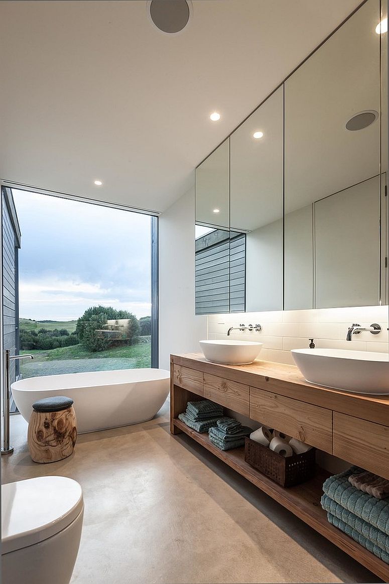 Turn to the vanity to introduce wooden element into the modern bathroom