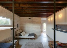 Unique-design-of-beds-and-use-of-recycled-materials-adds-to-the-appeal-of-stylish-cabin-217x155