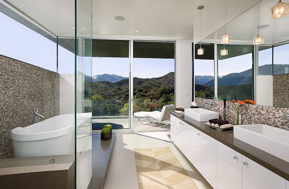 View outside is the focal point inside this captivating contemporary bathroom