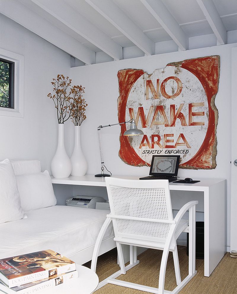 Vintage sign adds color to the white home office [Design: Bruce Bierman Design]