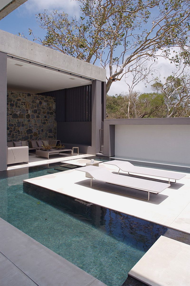 Water features and outdoor spaces define the minimal Aussie island home