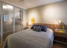 Wooden-accent-wall-inside-the-contemporary-bedroom-217x155