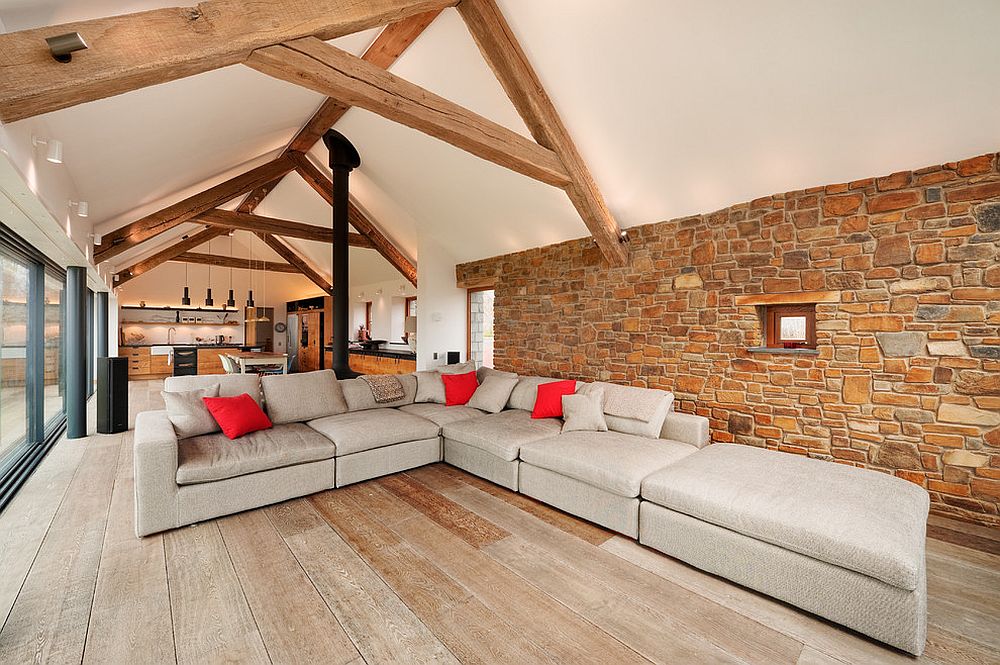 Wooden beams create a common visual across the open plan living