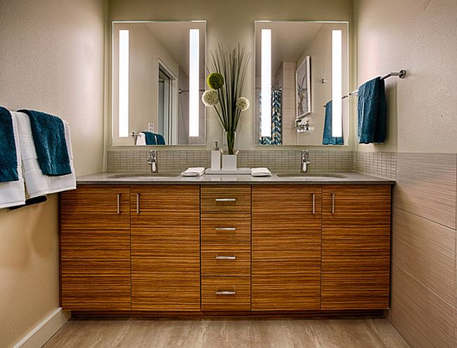 Wooden vanity in the bathroom with lovely lighting above