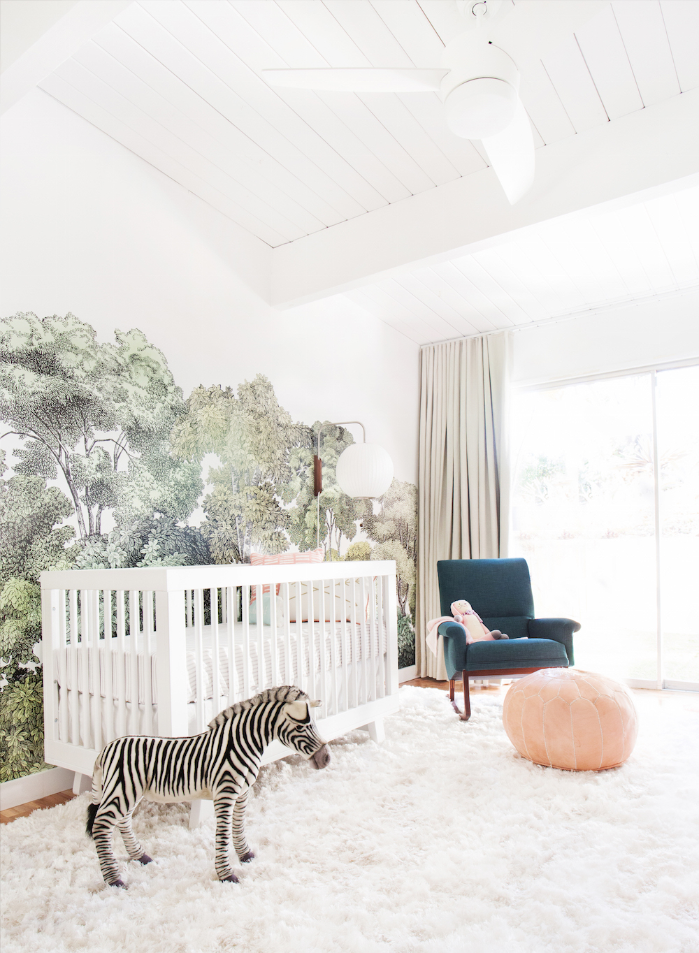 A shaggy rug makes a big impact in a baby's nursery