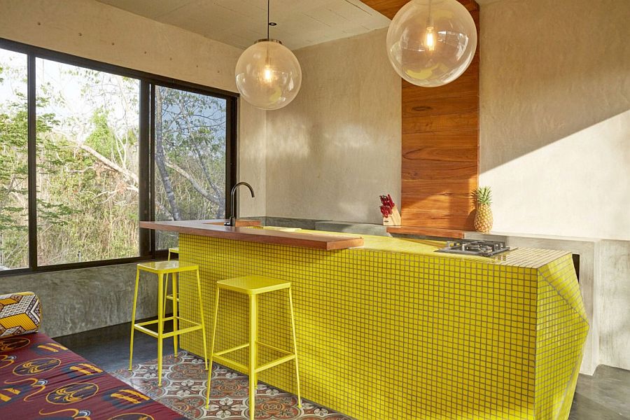 A splash of yellow revitalizes the kitchen island