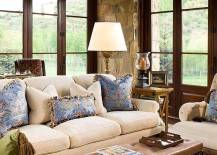 Accent-pillows-in-blue-add-color-to-the-rustic-family-space-217x155