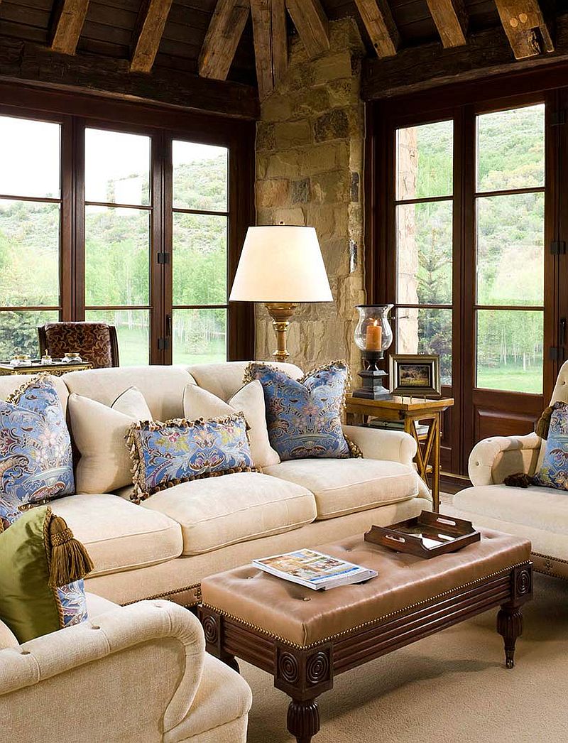 Accent pillows in blue add color to the rustic family space