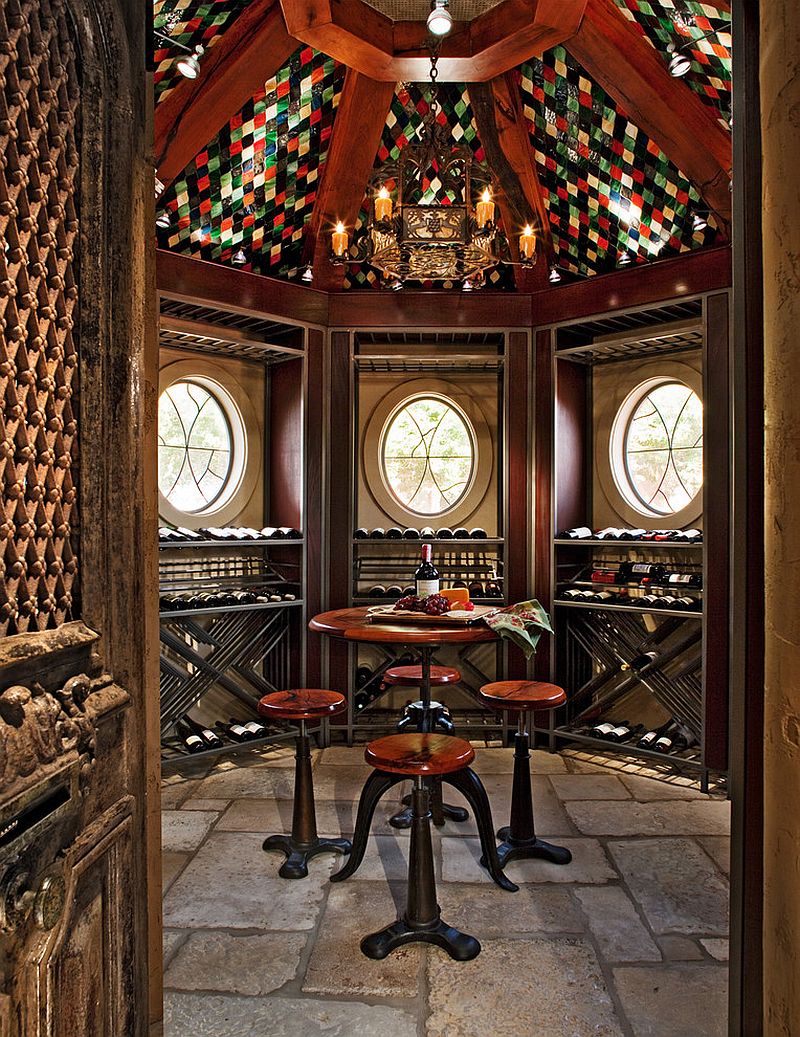 Antique chairs and table for one of a kind tasting room [Design: Michael Lyons Architect]