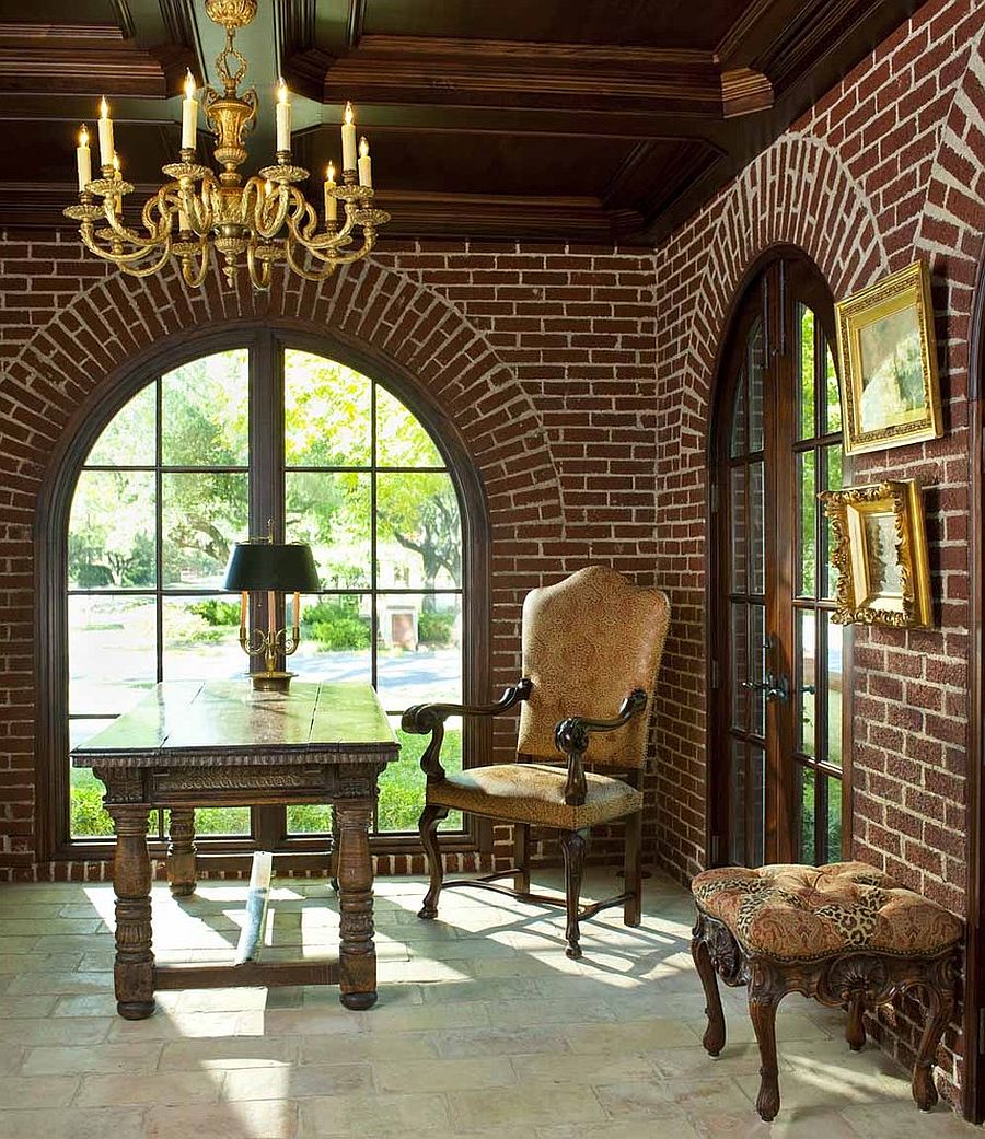 Arched windows and brick walls give the home office a traditional and timeless look