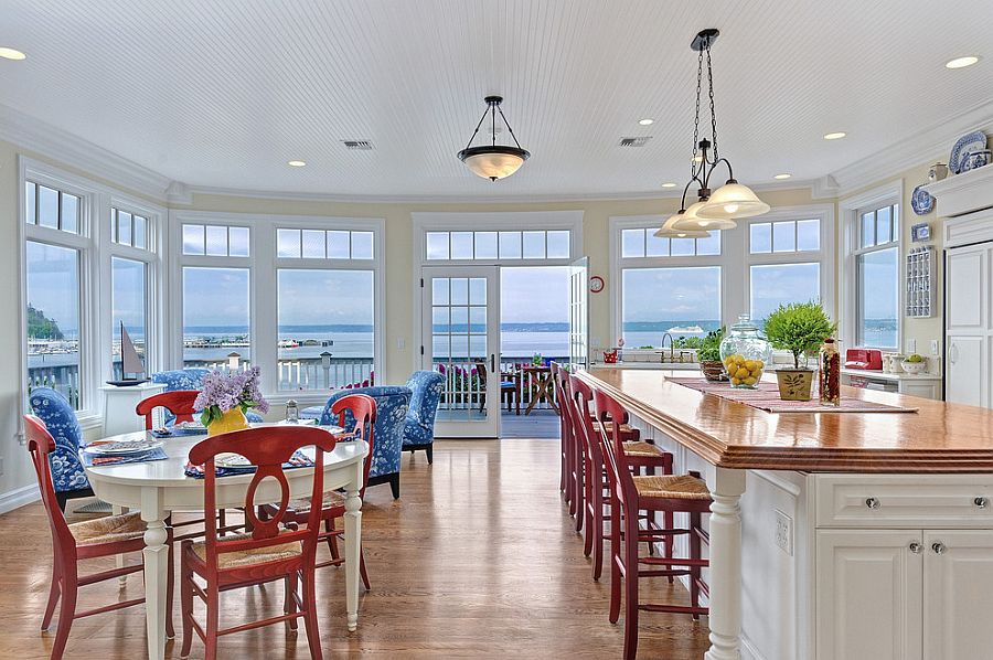 Beach style kitchen and dining with pops of bright color [Design: Eric Gedney]