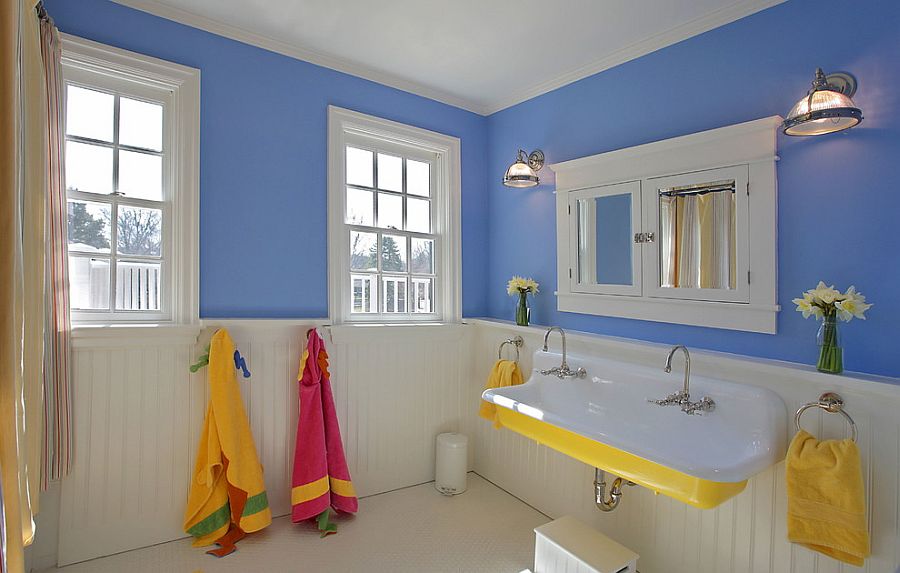 Blue and white bathroom with sink in yellow