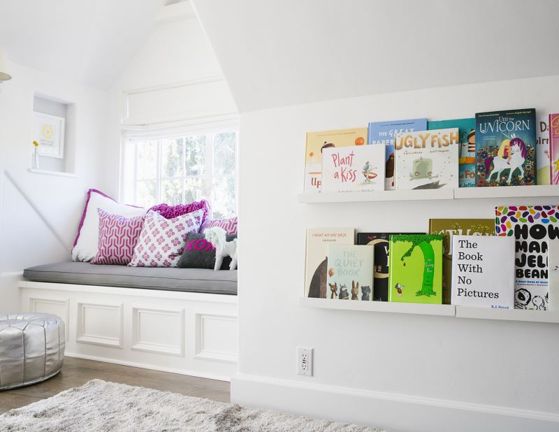 Book display shelves in a child's bedroom