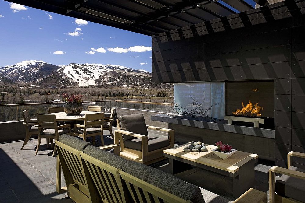 Consider the view outside before planning a cool outdoor living space with fireplace [Design: b+g design]