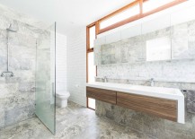 Contemporary-minimal-bathroom-design-in-stone-with-a-bespoke-vanity-217x155