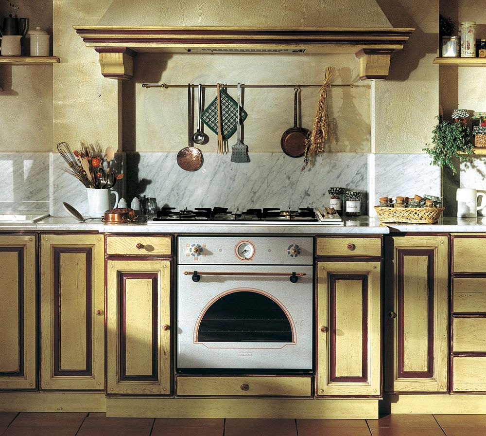 Country style Granduca kitchen with custom cabinetry and marble backsplash