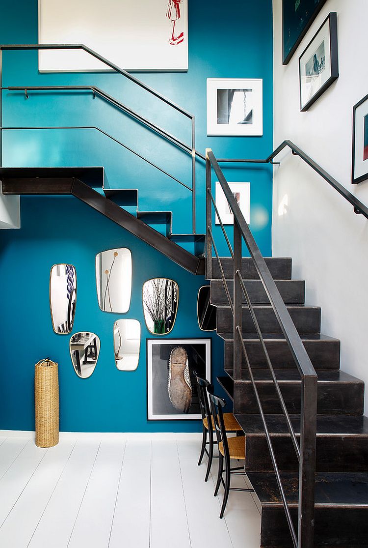 Curated mirror display under the staircase