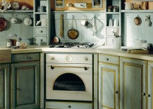 Custom-cabinetry-and-stone-or-marble-tiles-worktops-draw-inspiration-from-Mediterranean-kitchens-217x155