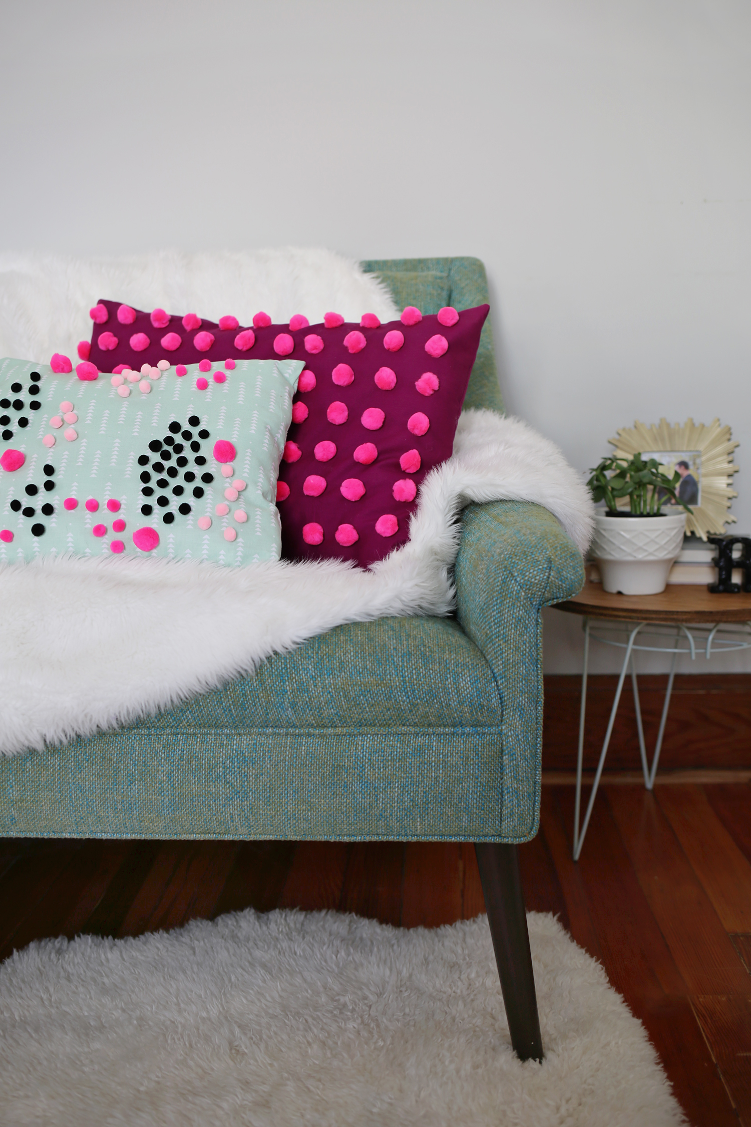 DIY pom pom pillow from A Beautiful Mess