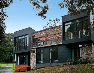 Pavilion House Down Under Charms with Open Courtyard and Lovely Views