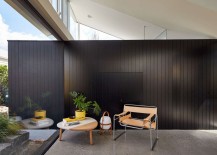 Dark-wall-adds-visual-contrast-to-the-open-and-airy-contemporary-interior-217x155