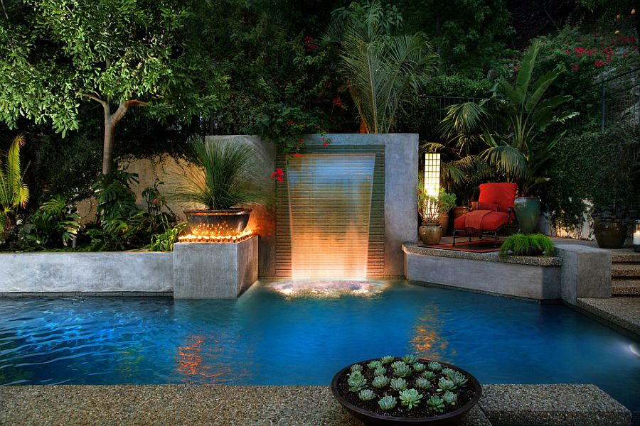 Delightful backyard escape with pool, waterfalls and ample greenery