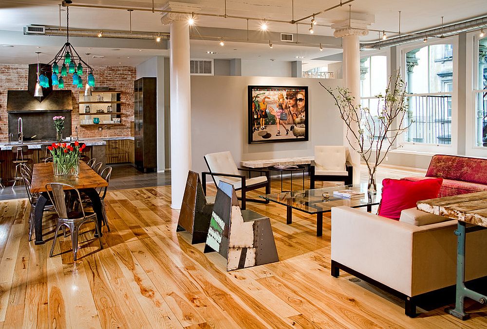 Dining room with Marais A Chair next to the industrial living room [Design: threshold interiors]