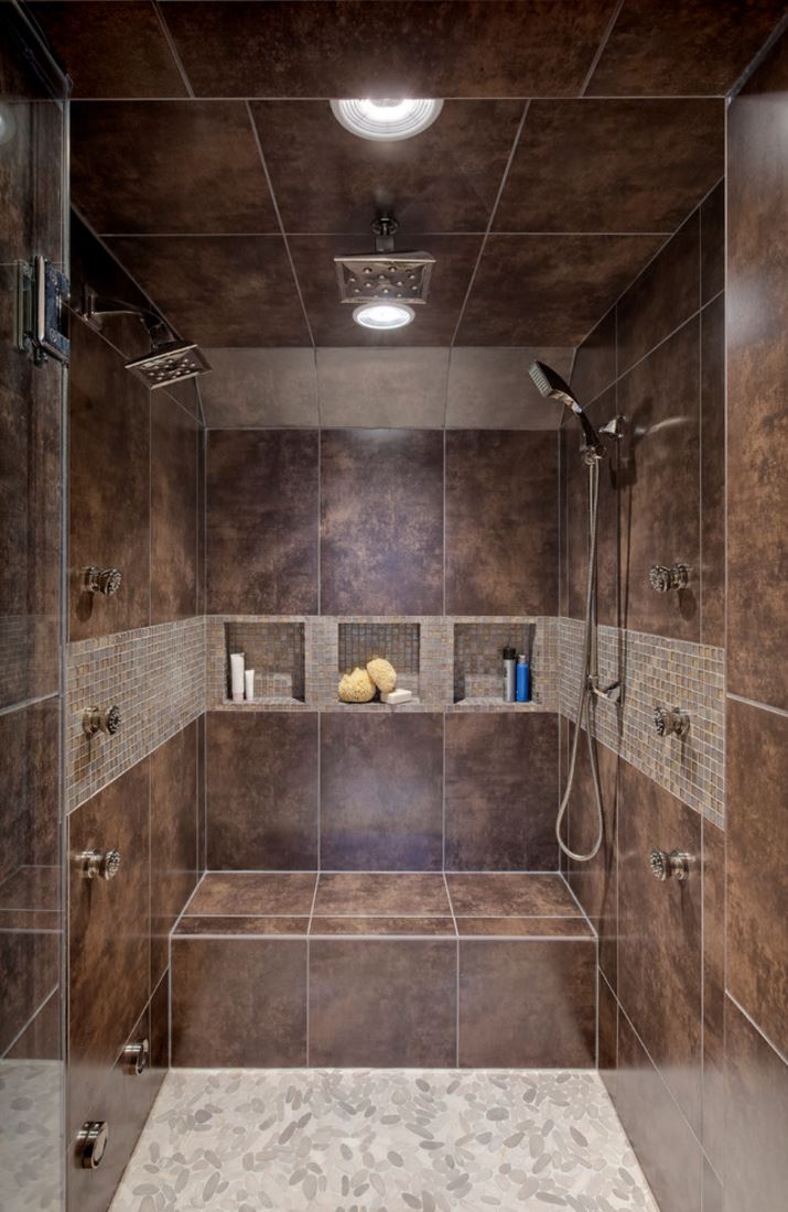 Earth-toned shower with more than one shower head