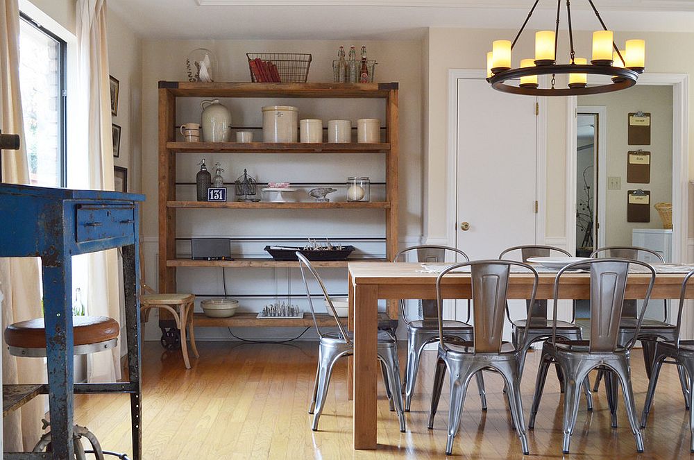 Eclectic dining room with vintage charm and 1930s Marais A Chair