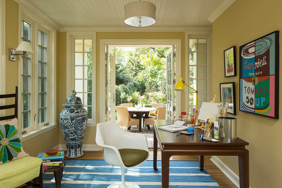 Eclectic home office with a splash of blue