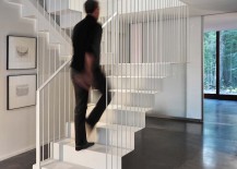 Fabulous-and-stylish-staircase-design-supported-by-metal-rods-217x155