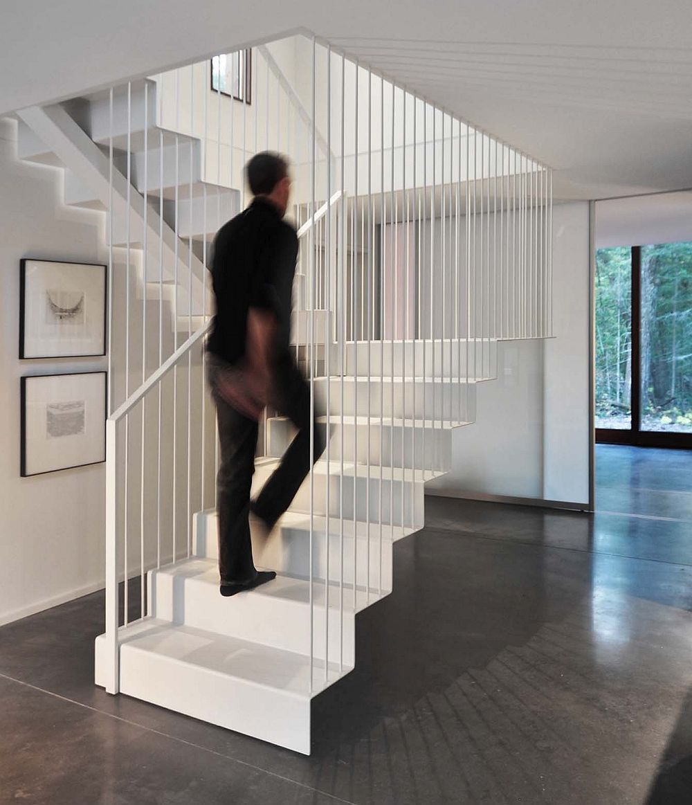 Fabulous and stylish staircase design supported by metal rods