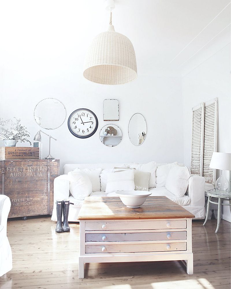 Finish of the clock lets it blend in with the mirror collection [Design: A Beach Cottage]