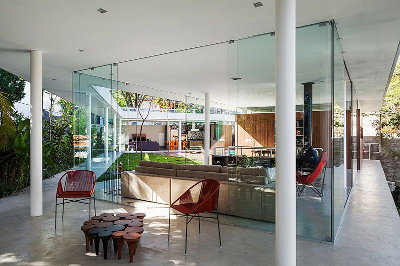 Glass walls completely open up the interior to the landscape outside