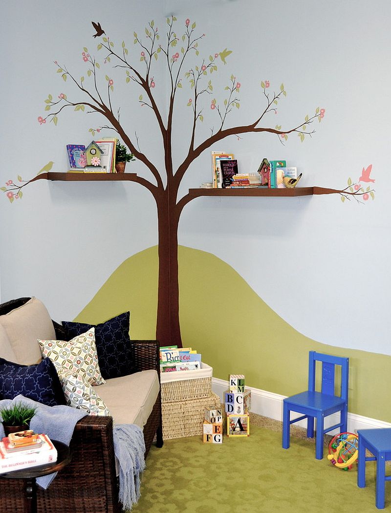 Hand-painted tree and cool shelves create a fun reading zone in the kids' room