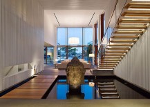 Indoor-pond-floating-walkway-and-stairs-steal-the-show-inside-the-home-217x155