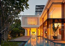 Interior-of-the-No-2-home-in-Singapore-flows-into-the-ponds-and-pool-area-outside-217x155